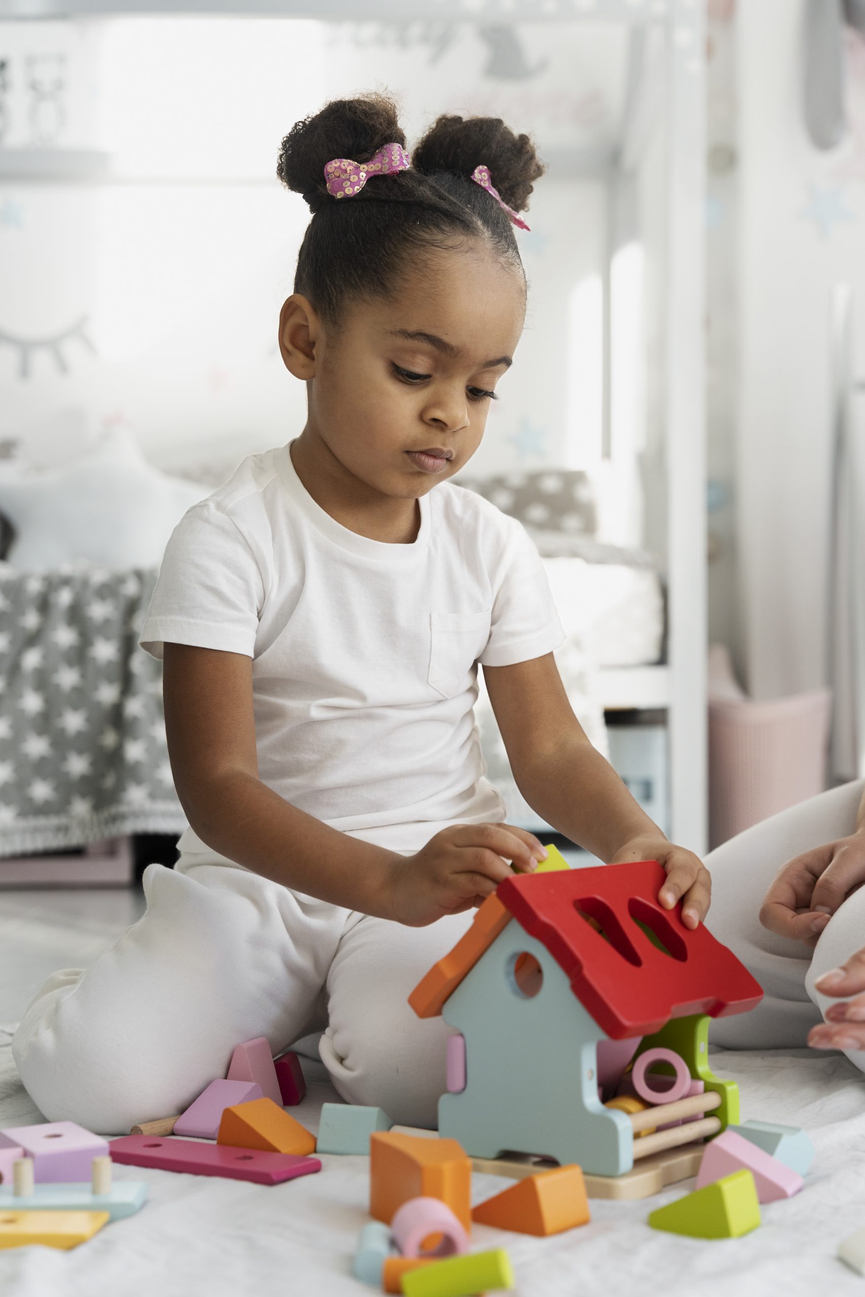 Child playing with a learning game